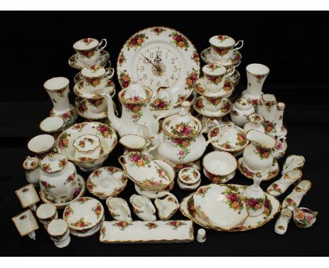 A Royal Albert Old Country Roses pattern tea, coffee and dinner service, wall clock, place mats, vases, trinkets, qty (88)