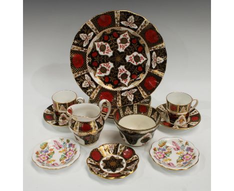 An Abbeydale Chrysanthemum pattern shaped circular dessert plate, pair of coffee cans and saucers, three tea plates, trinket 