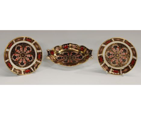 A pair of Royal Crown Derby Imari palette 1128 pattern circular pin dishes, 11cm, printed marks, first quality; another shape