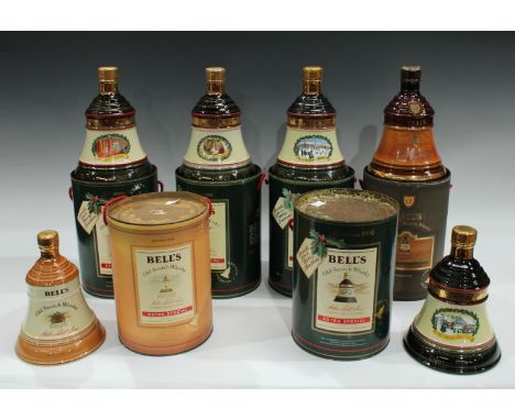 A Bell's Scotch Whisky bell shaped decanter, cylindrical box, 1988, others similar 1989, 90 and 91; two others, all boxed all