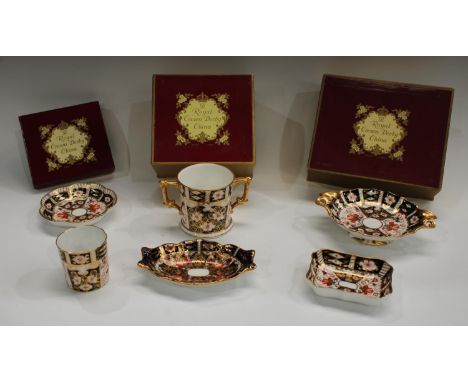 A Royal Crown Derby Imari palette 2451 pattern two handled loving cup, first, boxed; others similar 2451 pattern pedestal bon