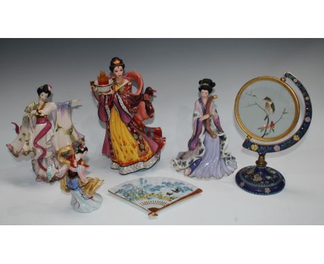 A Franklin Mint figure, Diamond Fire Empress, designed by Lena Liu, 26.5cm; another, Harp princess; others similar, Bradex Si