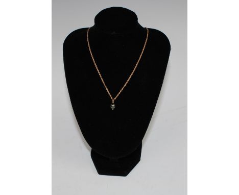 A South Sea Islands grey cultured pearl diamond accented pendant necklace, 9ct gold fine link chain, stamped 375, 3.4g gross,