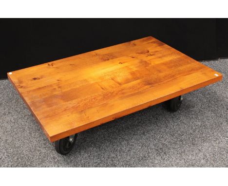 An oak 'roller' coffee table, 120cm long, 80cm wide