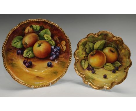 A Coalport cabinet plate painted with ripe fruit on a mossy bank, signed B Hancock, raised gilded border, 27cm, first; anothe