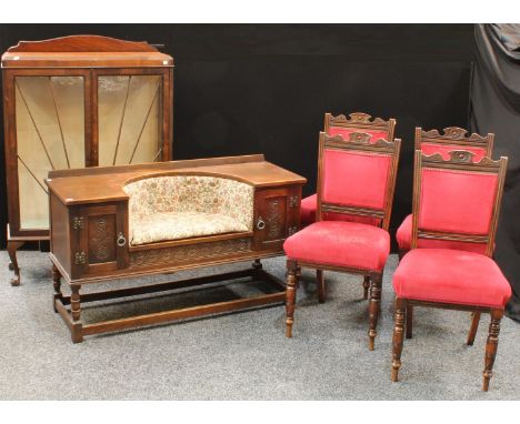 An oak hall bench, in the 17th century taste; a set of four Edwardian dining side chairs; an Art Deco display cabinet (6)