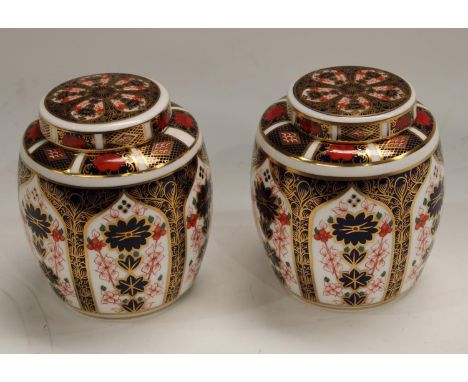 A pair of Royal Crown Derby Imari palette 1128 pattern ginger jars and covers, 11cm, printed marks, first quality