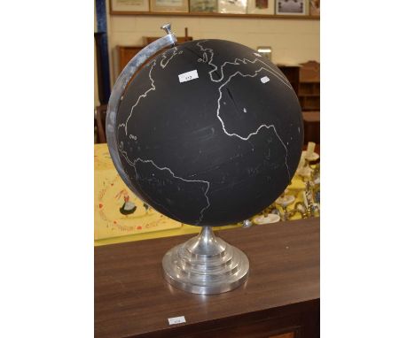 A black hand painted globe
