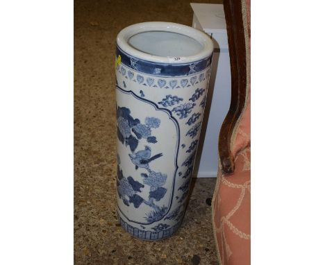 A modern Chinese blue and white cylindrical stick stand