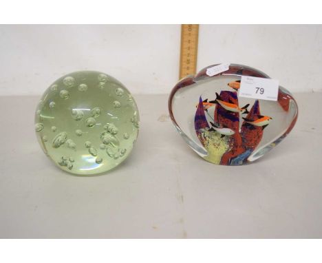 An Art Glass paperweight decorated with fish, probably Murano together with one other