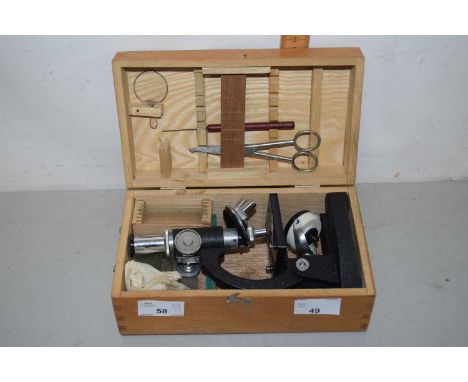 A cased student's microscope