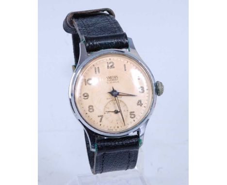 A Smith's Everest gent's steel cased wristwatch, the signed champagne dial having luminous Arabic numerals, subsidiary second
