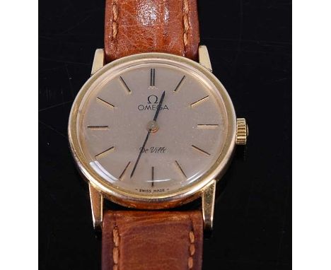 A lady's Omega DeVille gold plated wristwatch, having a signed champagne dial, manual wind movement, steel back cover, case d