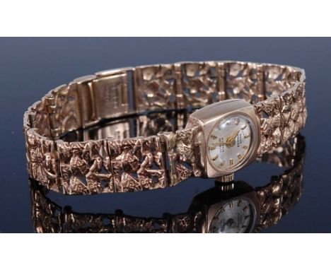 A 9ct yellow gold lady's Swiss Empress 12-jewel incabloc manual wind wristwatch, with round silver baton dial and integral op