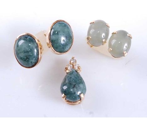 A yellow metal, jadeite and diamond pendant together with two pairs of jadeite stud earrings, the pendant featuring a pear sh