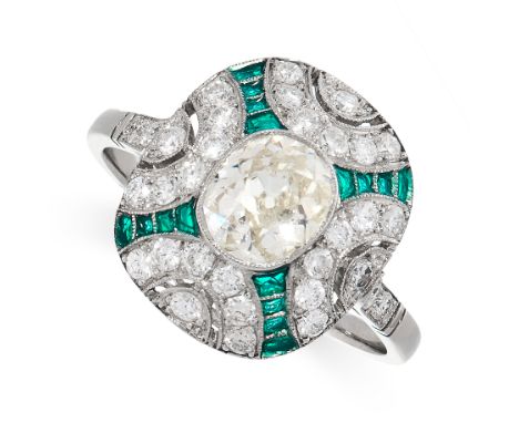 DIAMOND AND PLIQUE A JOUR ENAMEL RING in Art Deco style, comprising of a central oval old cut diamond of 0.72 carats in a bor