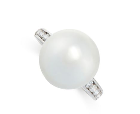 PEARL AND DIAMOND RING comprising of a central pearl of 13.7mm between two rows of round cut diamonds, stamped 585, size Q / 