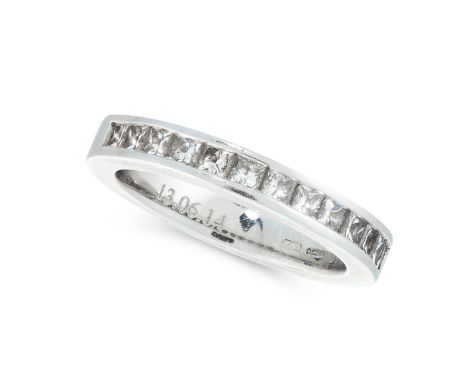 DIAMOND ETERNITY RING in platinum, the band designed as a half eternity, channel set with princess cut diamonds, totalling 0.