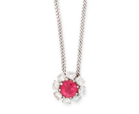 RUBY AND DIAMOND PENDANT NECKLACE set with a round cut ruby of 1.22 carats within a border of round cut diamonds, within a cu