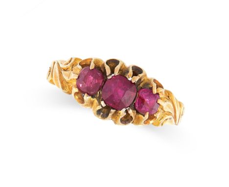 ANTIQUE RUBY RING in yellow gold, set with three graduated cushion cut rubies, unmarked, size N / 6.5, 4.1g. 