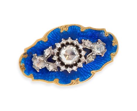 AN ANTIQUE DIAMOND AND ENAMEL DRESS RING in high carat yellow gold, the stylised face set with a cluster of rose cut diamonds