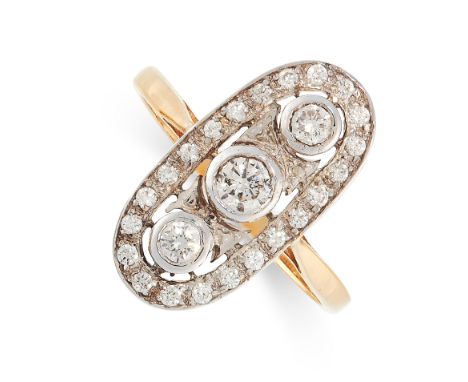 DIAMOND DRESS RING in 18ct yellow gold, set with three principle diamonds totalling 0.24 carats in an oval border of further 