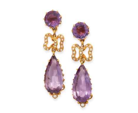 ANTIQUE AMETHYST AND PEARL EARRINGS in yellow gold, comprising of a round cut amethyst above a ribbon motif set with seed pea