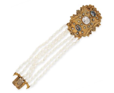 PEARL AND GEMSET BRACELET comprising of six strands of baroque pearls on an antique clap set with three oval cut blue gemston