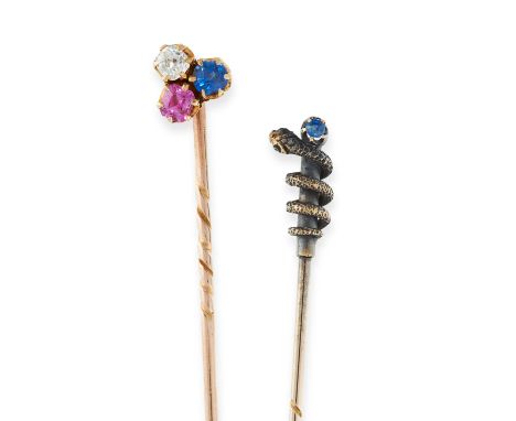 TWO ANTIQUE TIE / STICK PINS in yellow gold and silver, one set with a round cut ruby, diamond and sapphire, the other design