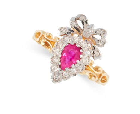 RUBY AND DIAMOND SWEETHEART RING in 18ct yellow gold, in ribbon and heart motif set with a pear cut ruby in a border of round