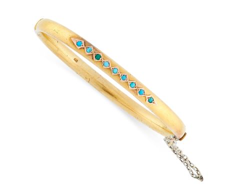 ANTIQUE TURQUOISE BANGLE, 19TH CENTURY in yellow gold, set with nine turquoise cabochons, SR maker’s mark, unmarked, inner di