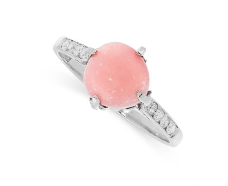 CONCH PEARL AND DIAMOND RING comprising of a conch pearl of 7.6mm between rows of single cut diamonds in the shoulders, signe