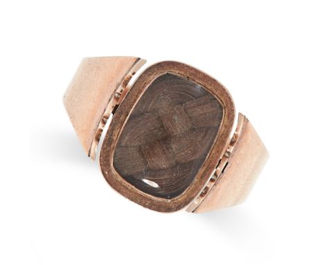 AN ANTIQUE SPINNING ENAMEL AND HAIRWORK MOURNING RING, 1808 in 18ct yellow gold, the spinning rectangular central panel with 