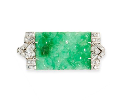 ART DECO NATURAL JADEITE JADE AND DIAMOND BROOCH comprising of a central rectangular jadeite jade plaque carved with scrollin
