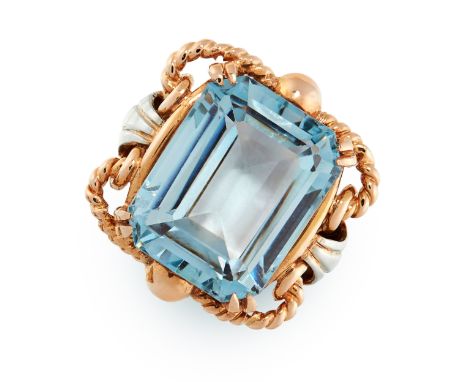 RETRO BLUE GEMSTONE RING comprising of an emerald cut blue gemstones of 13.62 carats in two-tone rope motif border, unmarked,