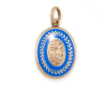 ANTIQUE ENAMEL MOURNING LOCKET PENDANT in yellow gold, of oval form, decorated with blue enamel and an engraved foliate desig