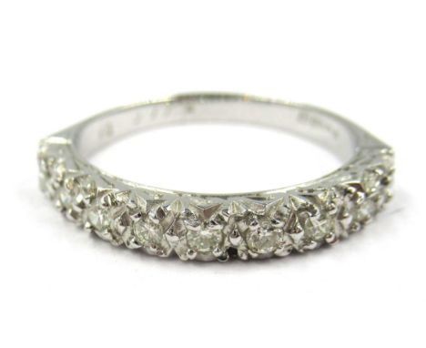 18ct White gold nine stone diamond set half eternity ring, size Q3.7g 