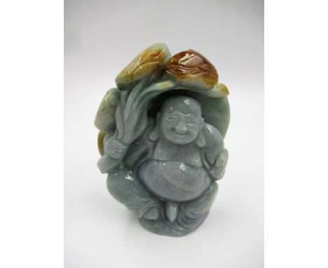 20th Century two colour celadon jade figure of a standing Buddha, 11cm high approximately 