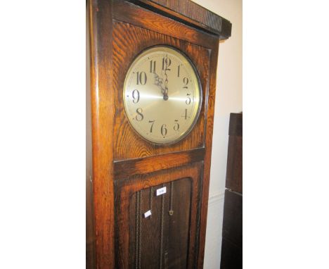 Early to mid 20th Century oak longcase clock with a three train weight driven striking movement, 192cms high together with a 