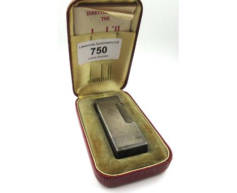 Silver plated Dunhill lighter with engine turned decoration in original boxNot working. Tarnished but otherwise in good condi