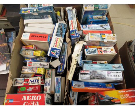 Two boxes containing forty six unmade plastic aircraft kits including Airfix, Italeri, Ravel and Esci 