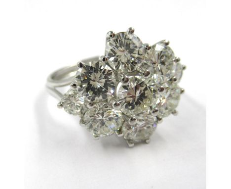 18ct White gold nine stone brilliant cut diamond set ring, approximately 3ct total, size N.5 