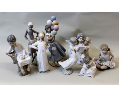 Group of six various Lladro figures, the tallest 27cms together with two Nao figures 