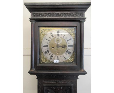 Carved oak longcase clock, late 17th / early 18th Century and later, the square hood above a rectangular panel door decorated