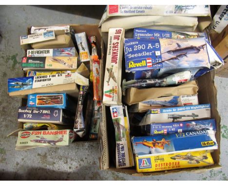 Two boxes containing twenty nine unmade plastic aircraft kits including Airfix, Italari, Revel and Esci 