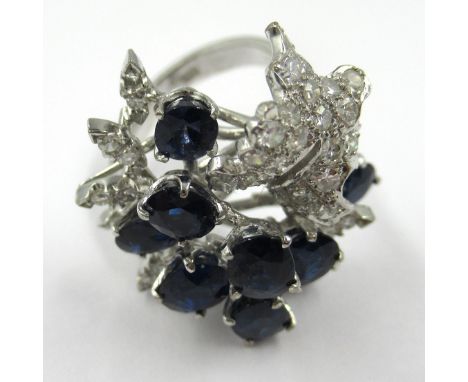 Large 18ct white gold sapphire and diamond floral cluster ring, size K 