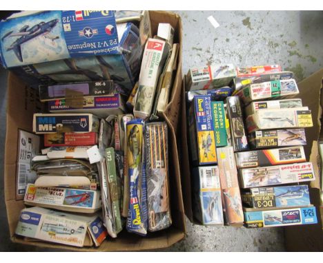 Two boxes containing forty four unmade plastic aircraft kits, including Airfix, Italari, Revel and Esci 