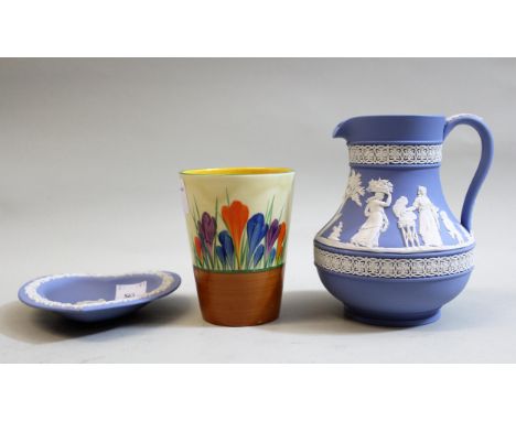 Clarice Cliff Bizarre Crocus pattern beaker, 9.5cms high together with two items of Wedgwood Jasperware 