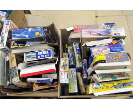 Two boxes of thirty unmade plastic aircraft kits including Airfix, Italeri, Ravel and Esci 