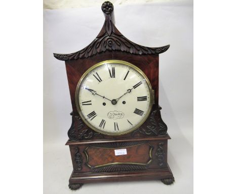 19th Century flame mahogany pagoda topped bracket clock having circular painted dial, with Roman numerals inscribed J.N. Hend